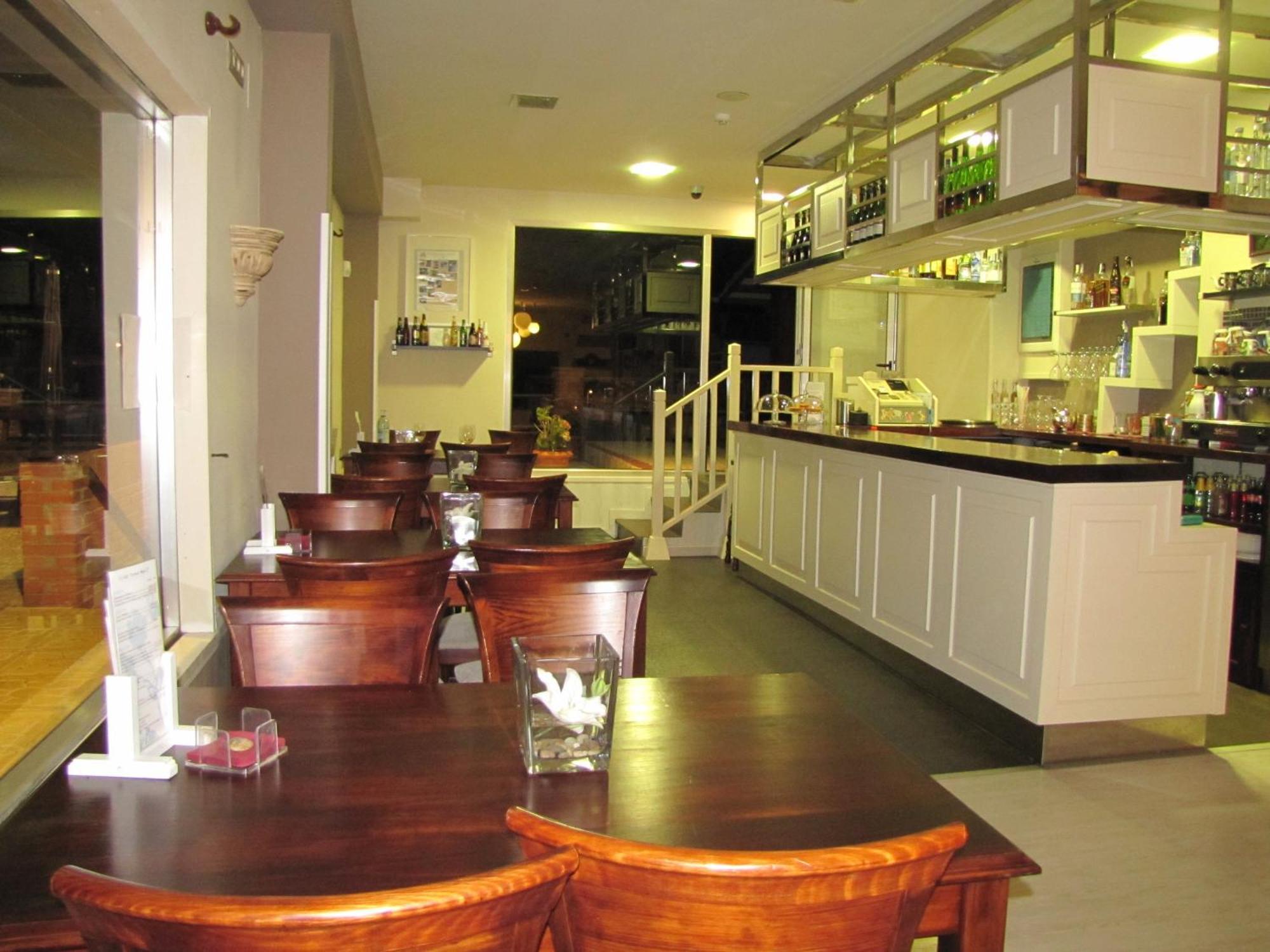 Hotel Migal كيو المظهر الخارجي الصورة